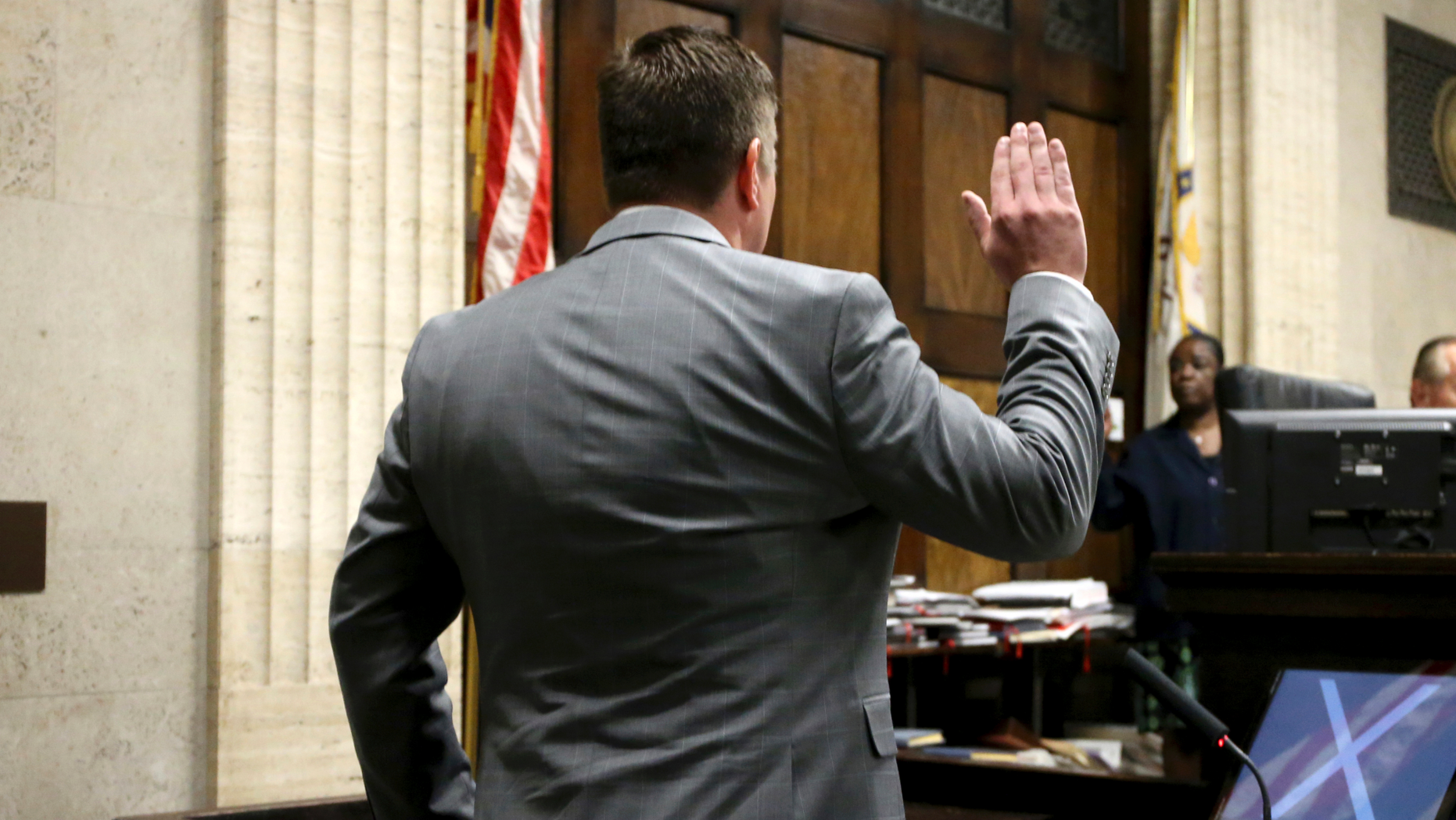 Chicago policeman accused of killing black teen takes stand at trial