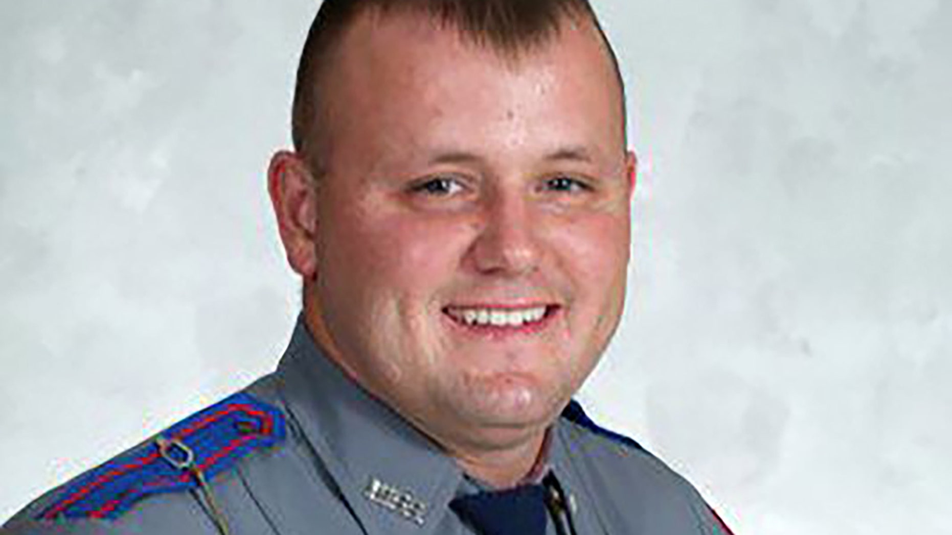 Officer Kenneth Smith was shot and killed Sunday.
