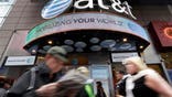 AT&T CEO: Consumers spending, but businesses are slowing down