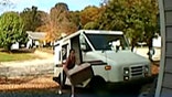 Postal worker fired after getting caught tossing package