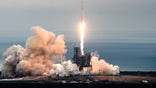 SpaceX to fly two people around the moon next year