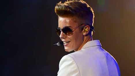 Justin Bieber says he didn’t grope breast of young fan, despite photographic evidence to the contrary