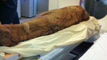 Museum curator Dr. Peter Schertz explains