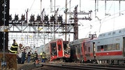 Emergency crews helping injured passengers