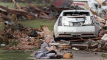 Tornado-wracked residents seek shelter as search for survivors continues