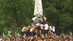 Naval Academy students climb Herndon Monument covered in lard