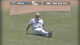 Manager plops down on the field.