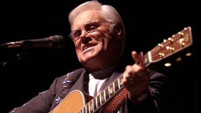 The life story of George Jones will be made into a movie Merle Haggard gets an honorary degree the late Buck Owens is awarded the presidential medal Locash Cowboys survive a bus crash Kacey Musgrave performs our featured song.