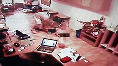 Child threatened and thrown down in classroom