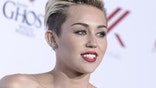 Miley Cyrus going too far in trippy, nude music video?