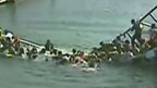 Dozens dunked after bridge gave way while visitors boarded ferry in China