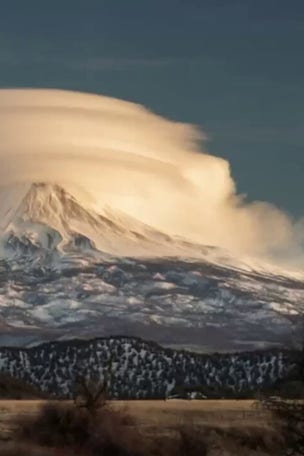 SEE IT: Clouds SWIRL around Mount Shasta peak