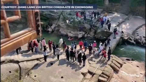 British diplomat praised as hero after dramatic rescue of drowning woman in China