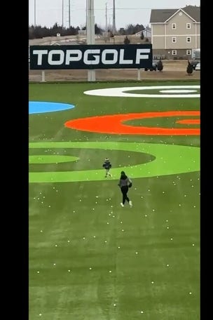 SEE IT: Kid runs onto DRIVING RANGE