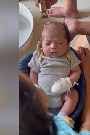 SEE IT: Baby's SERIOUS haircut