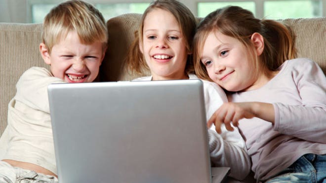 Kids on a Laptop Computer Having Fun