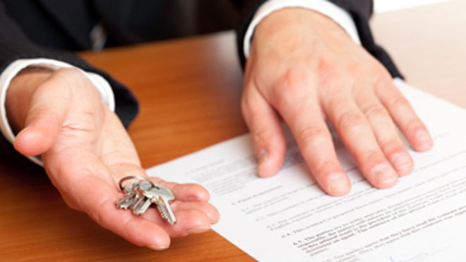 Handing Over Keys Business Sale or Apartment Rental