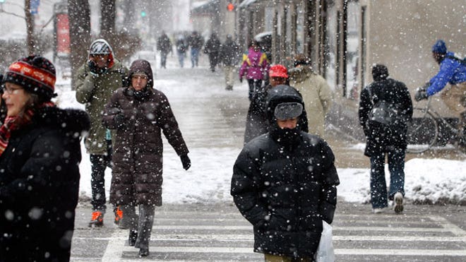 Winter Coats Pedestrians Walking, Reuters