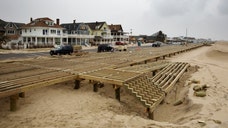 Days before Memorial Day weekend, small business owners along the Jersey Shore worry about a dampened summer season. But optimism prevails, as some finished rebuilding just in time for the first big weekend of the summer.