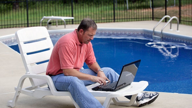 Man-Laptop-Pool-Outside