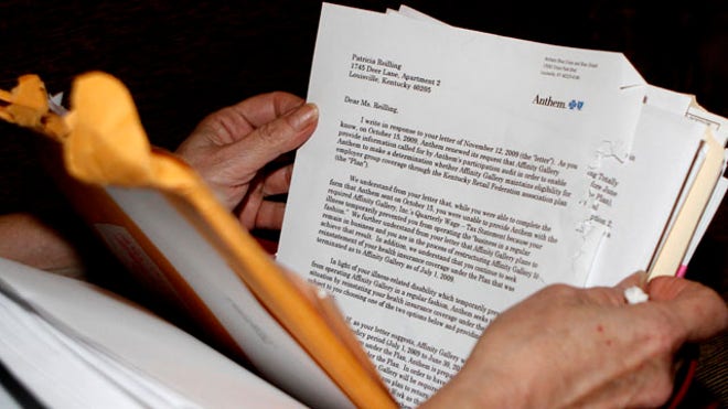 businessownerreadingpaperwork