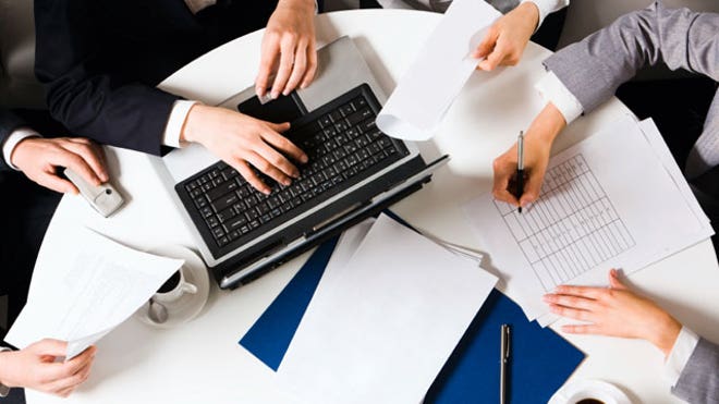 Business Planning Meeting at a Table