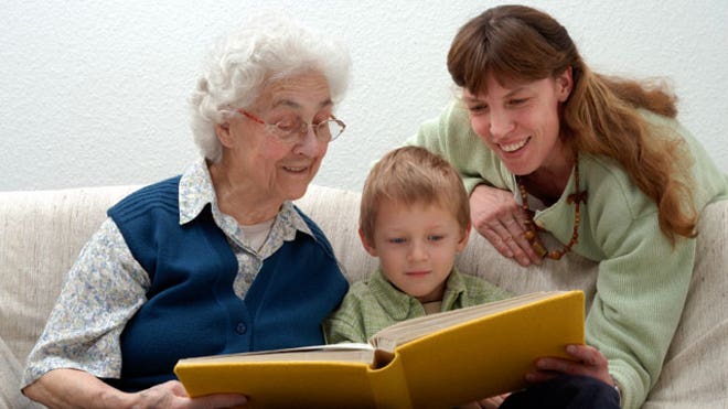 Child-Reading-Grandmother-Mother