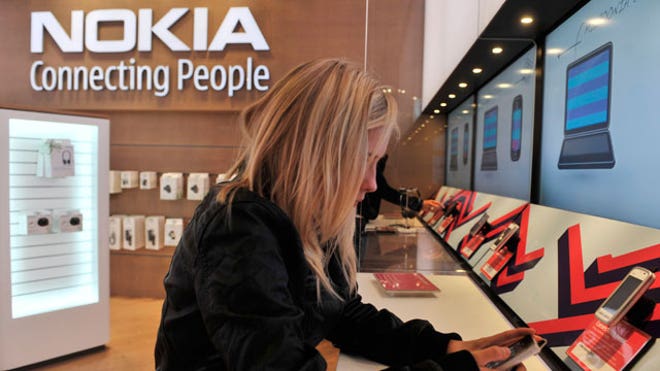Customer Tests Nokia Phone at Flagship Store