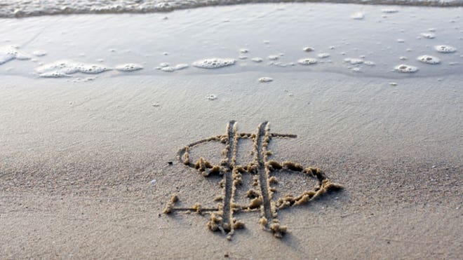 Dollar-Sign-Drawn-Sand-Beach