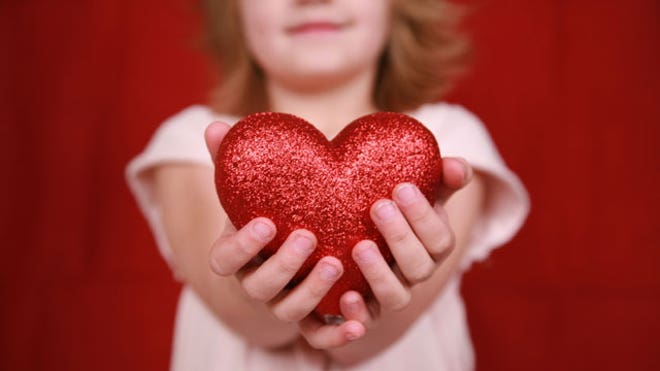 Girl-Holding-Heart