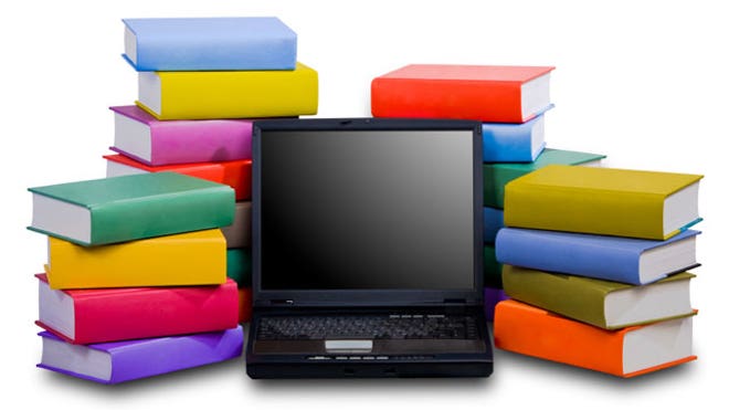Laptop-Books-Stacked-Behind