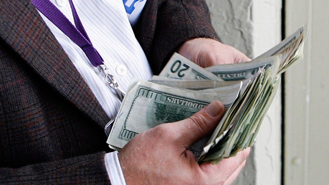 Man-Counting-Money-Cash-Dollars