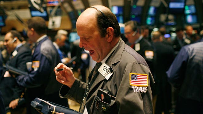 NYSE-Trader-002-Looking-at-Tablet