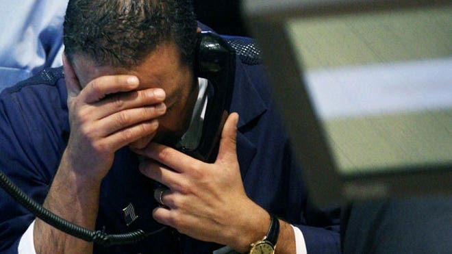 NYSE-Trader-069-on-Phone-Upset