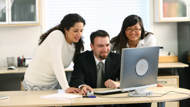 Small-Business-People-Using-Laptop