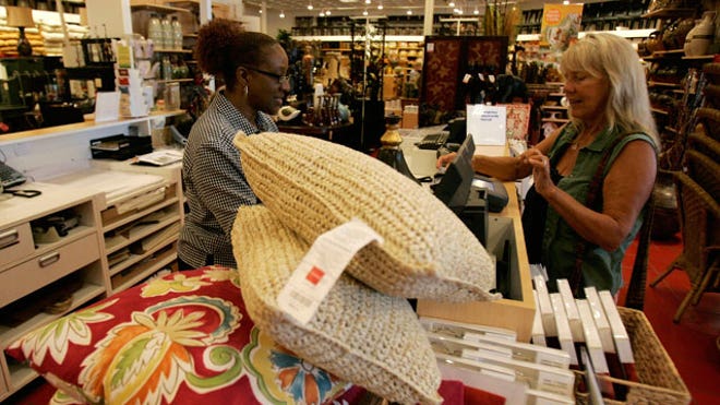 customer-buys-pillows-Pier-1-Imports-store