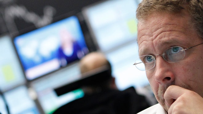 DAX/Frankfurt Trader Thinking with Monitors Behind