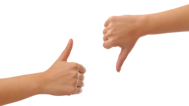 thumbs up thumbs down - istock