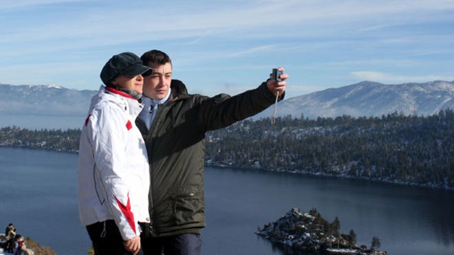 Couple Photographing Themselves on a Mountain