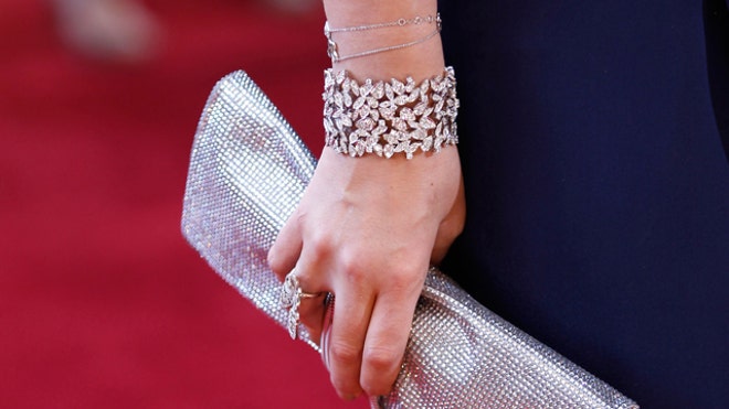Purse & Jewelry, Reuters