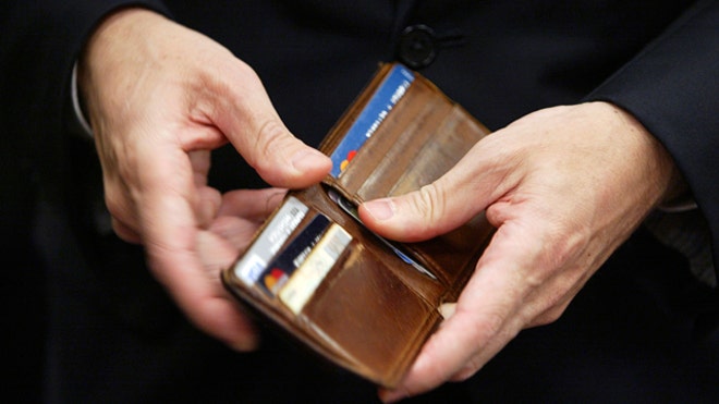 Man Opens Wallet, Reuters