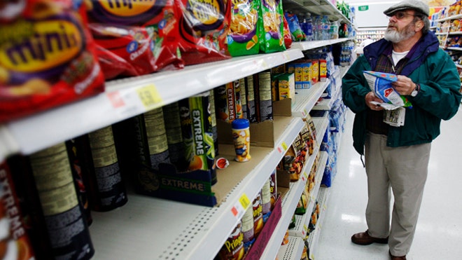 Older Man Grocery Shopping for Snacks