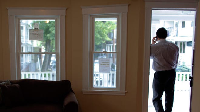 Homeowner on the phone Reuters