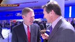 Ford chief executive Alan Mulally reveals the American automaker's refreshed Fusion lineup that is set to compete with rivals such as General Motors' Volt.