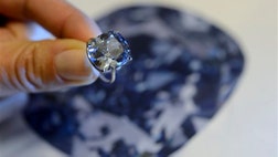 Sotheby's says a rare blue diamond offers marketed for a record $