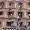 600 Indian students expelled after footage shows parents scaling walls to pass cheat sheets