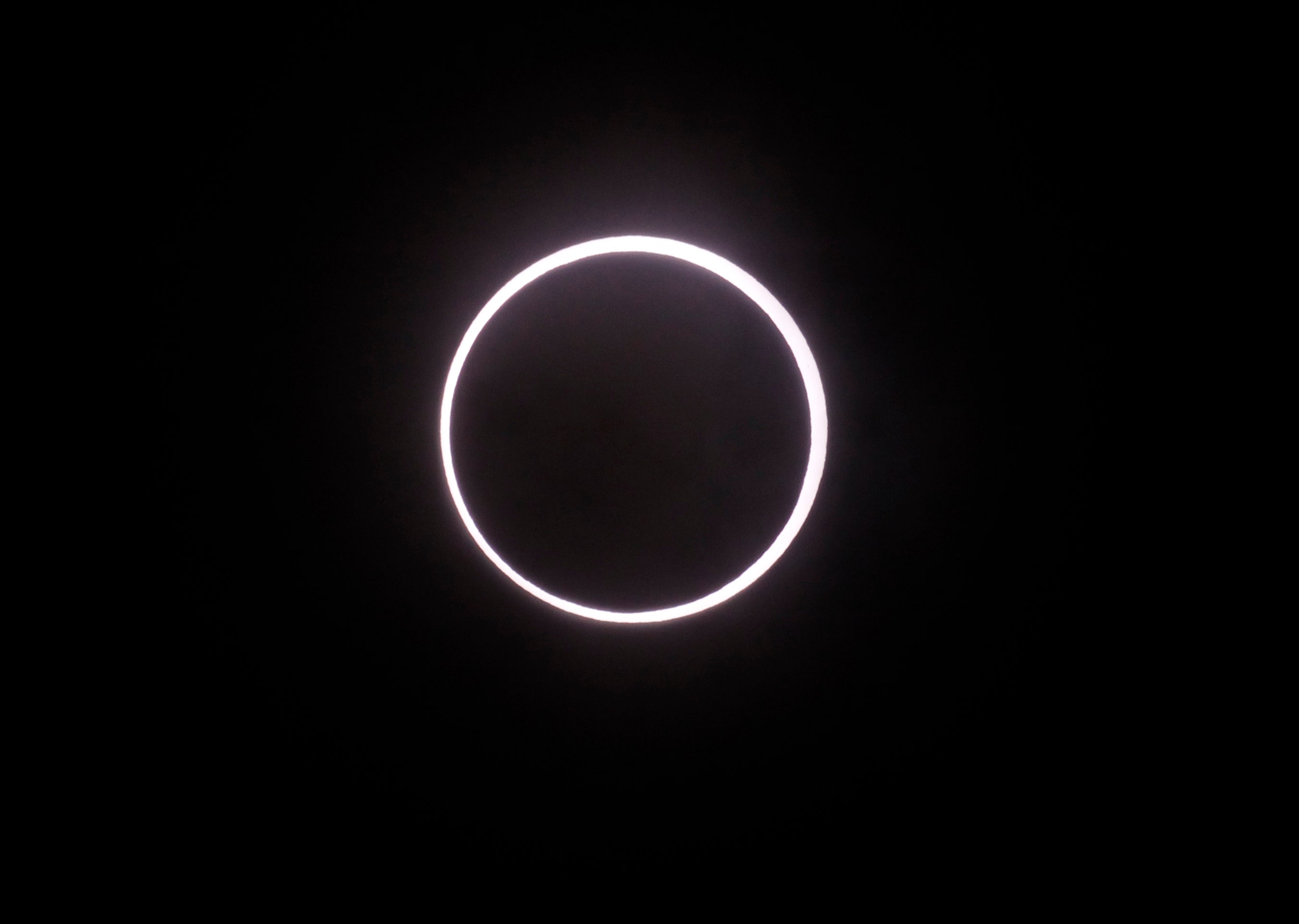 Millions watch as rare 'ring of fire' eclipse passes over Asia, US
