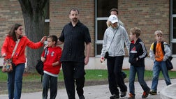 The landslide at Lilydale Regional Park swept over a group of children from Peter Hobart Elementary School in St. Louis Park, burying one to the waist and completely burying another, Fire Marshal Steve Zaccard said.