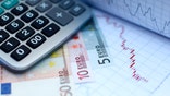 The euro dropped to an -month low against the U.S. dollar amid worries over the eurozone's debt crisis.