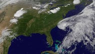 Forecasters say a cluster of storms gaining strength near the Southeast coast is moving west and is expected to become Tropical Storm Beryl over Memorial Day weekend.